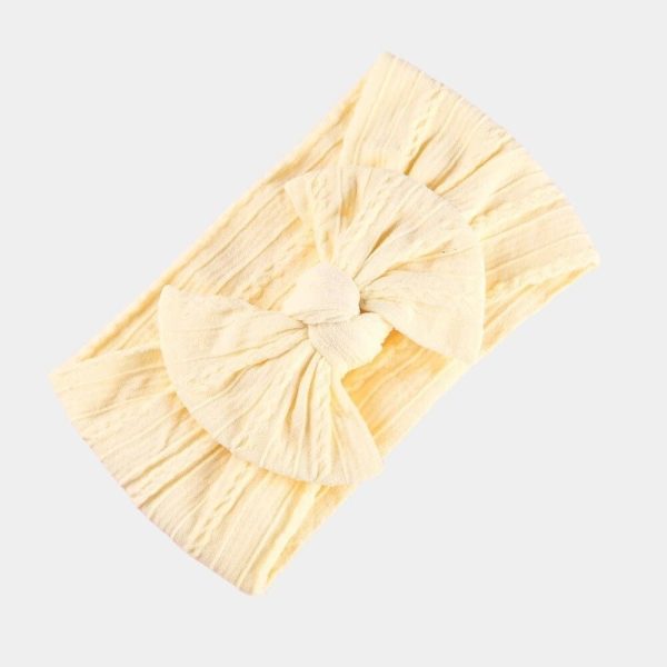 Bandeau bébé jaune clair avec gros nœud